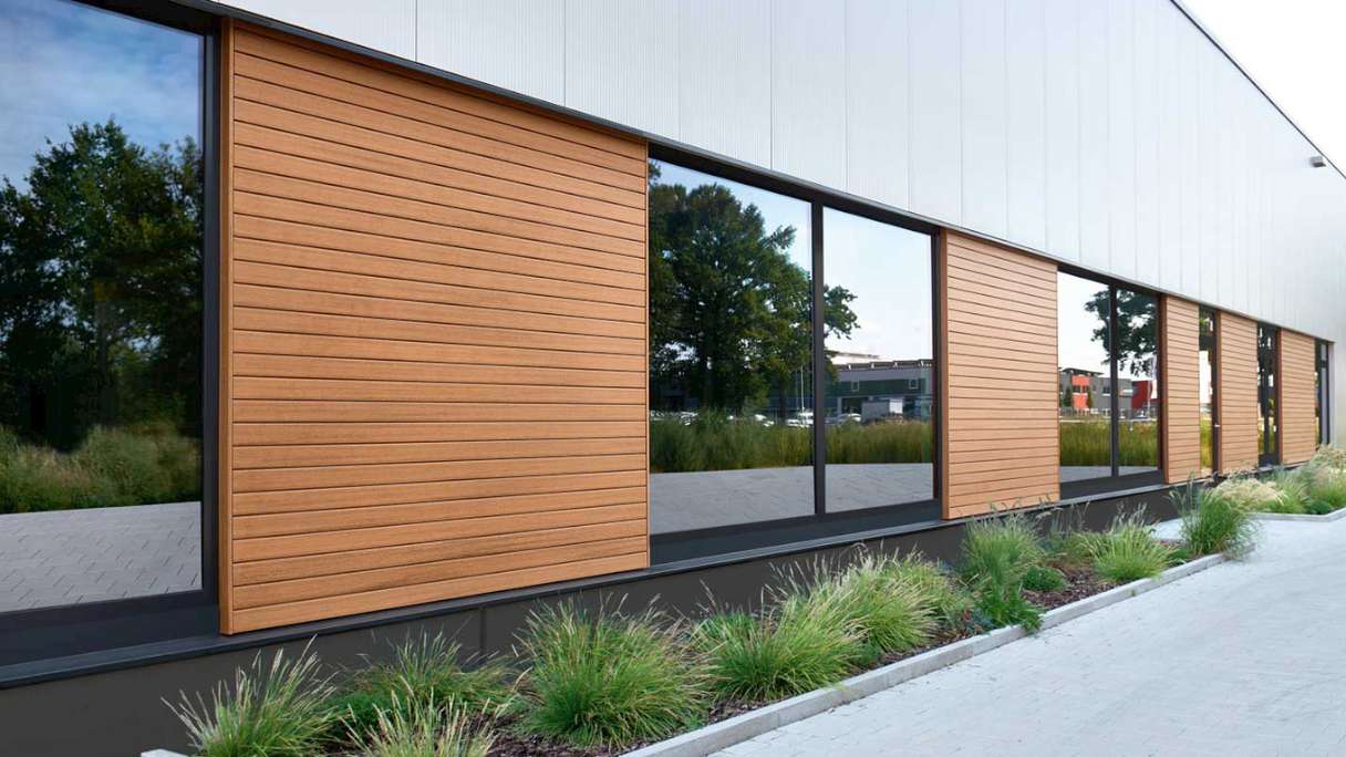 planeo Fassado - WPC rivestimento facciata a fasce romboidali in rovere marrone