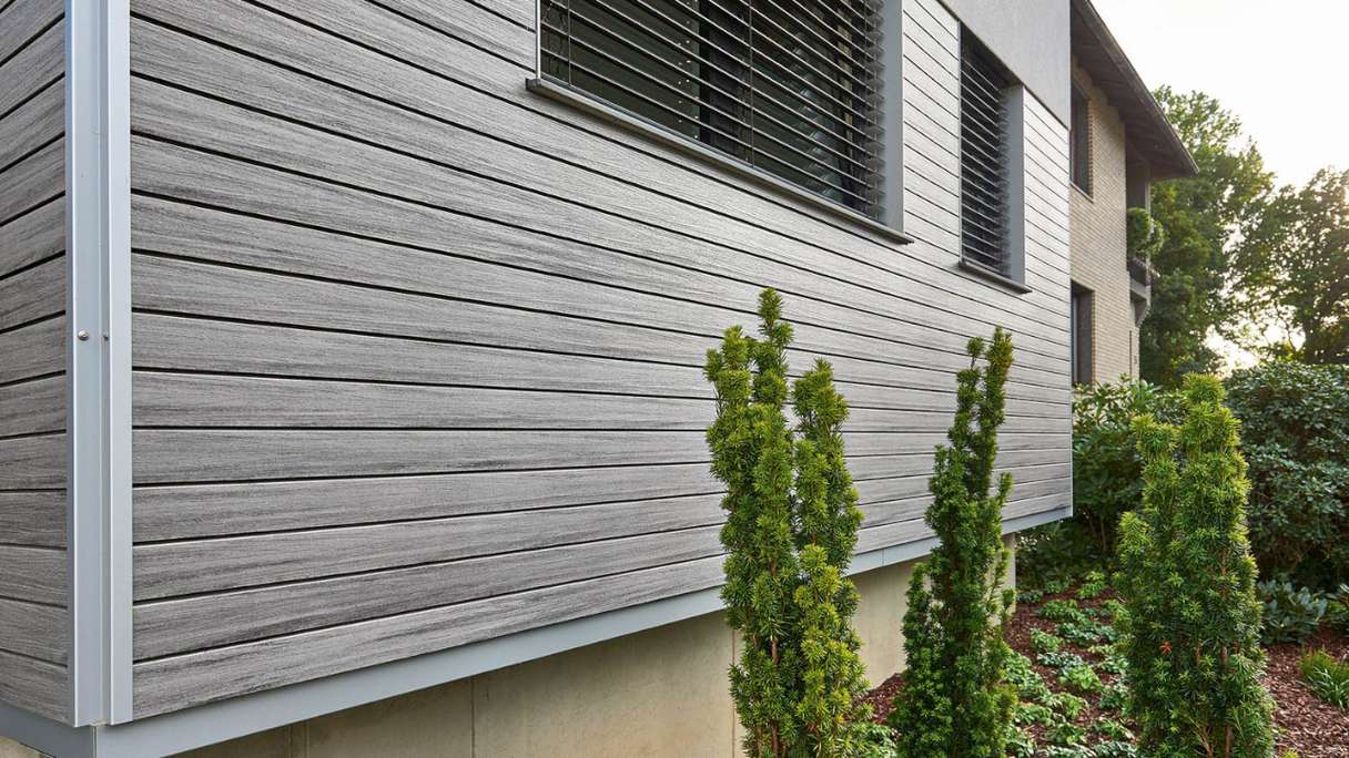 planeo Fassado - Rivestimento di facciata a fasce romboidali WPC grigio grafite