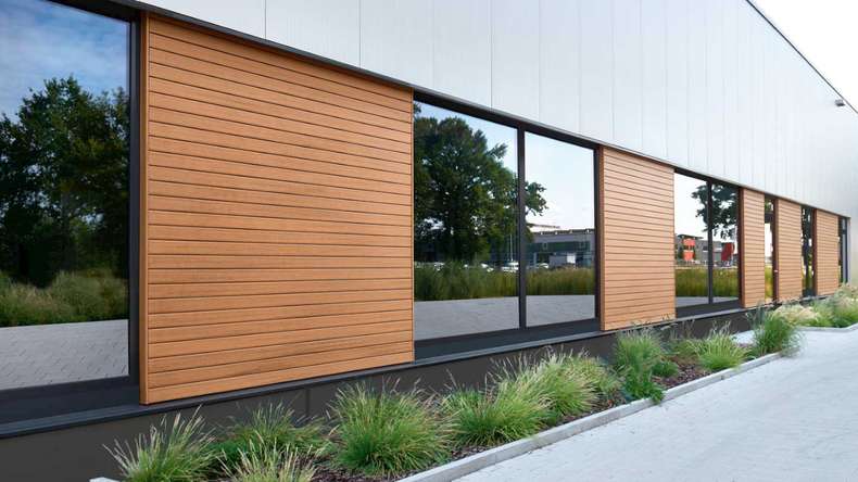 planeo Fassado - WPC rivestimento facciata a fasce romboidali in rovere marrone