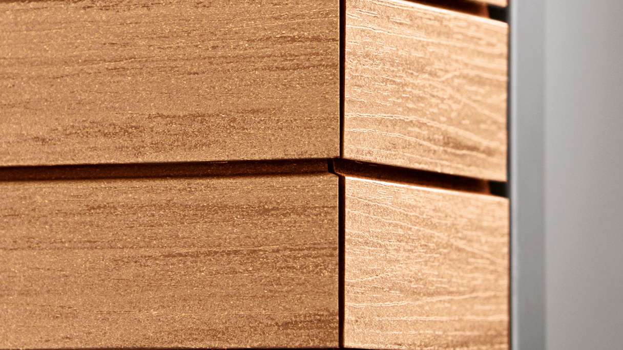planeo Fassado - WPC rivestimento facciata a fasce romboidali in rovere marrone