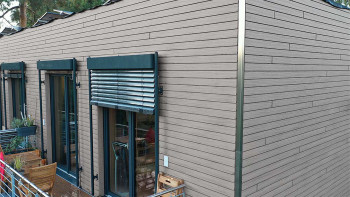 planeo Fassado - Rivestimento di facciata a rombi in WPC grigio pietra